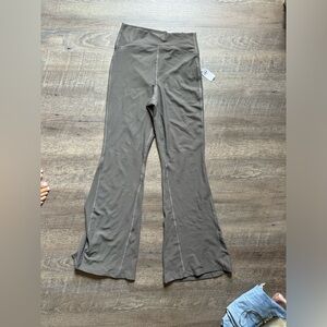 Old Navy flare leggings, light brown, and ribbed textured. Size small